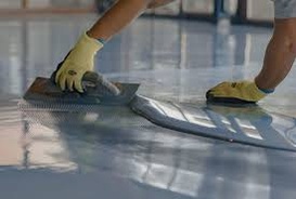 Applying epoxy coating to floor